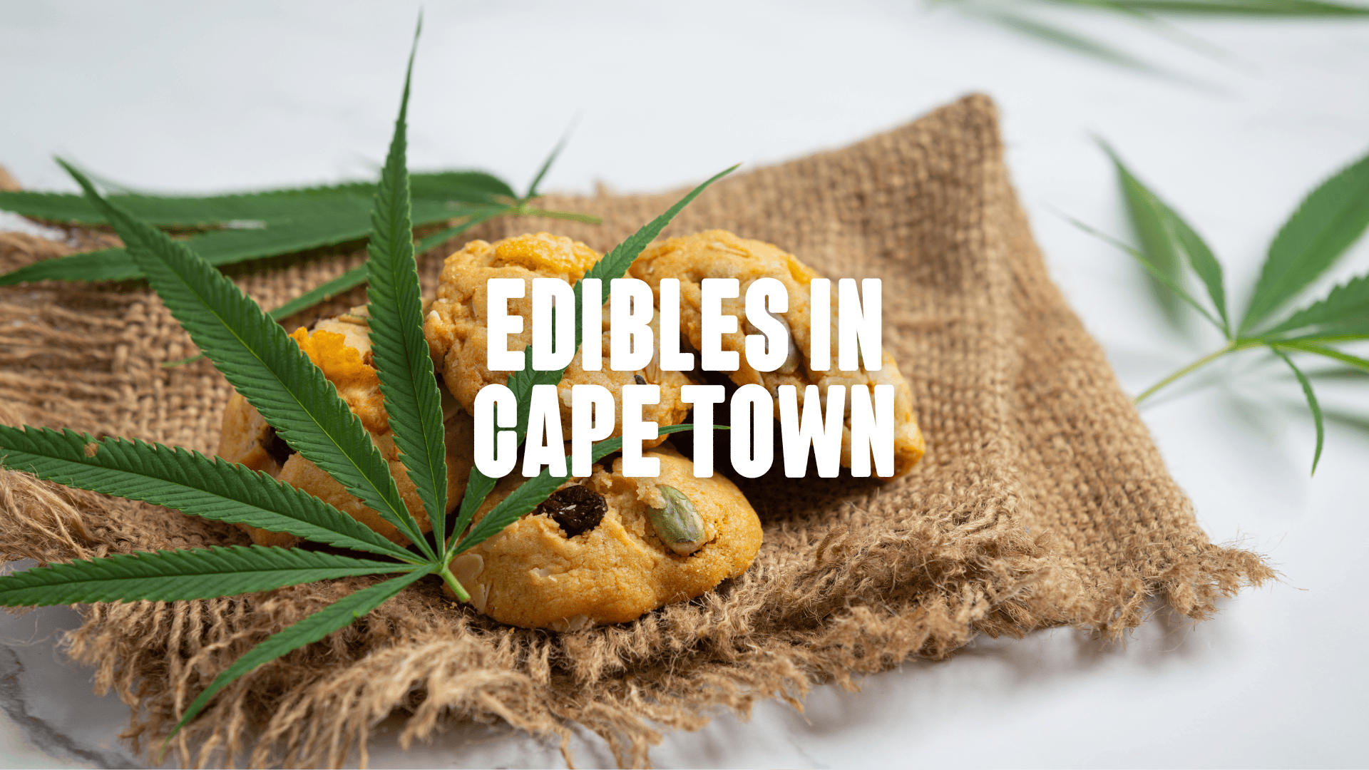 Cookies and cannabis leaf on a linen sack