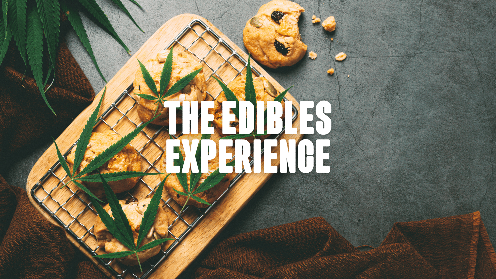 Cookies on a wooden tablet decorated with a cannabis leaf