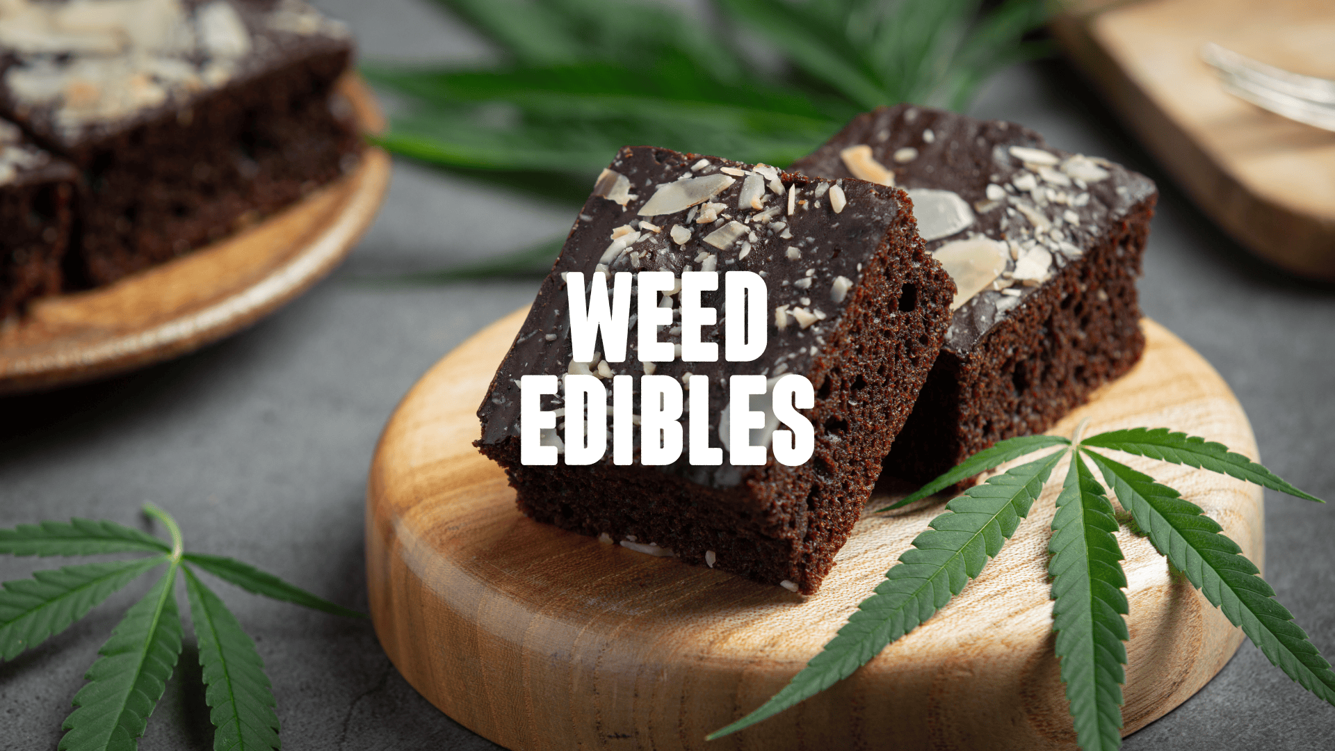 Brownies on wood tablet with weed leaf in background