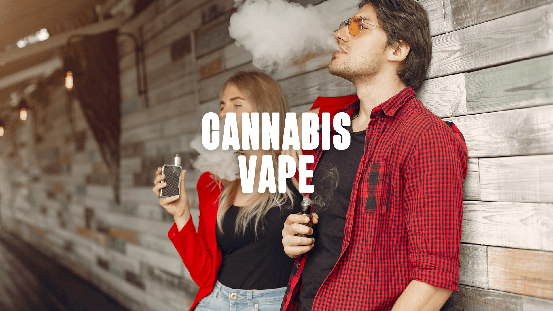 A man and a woman vaping